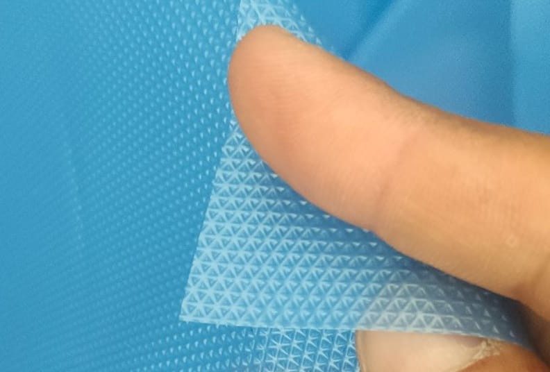 Diamond embossed polyethylene film